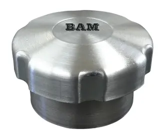 A silver cap with the word bam on it.