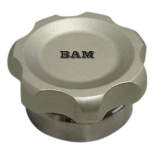 A silver metal object with the word bam on it.