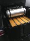 A machine is printing on yellow paper.