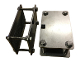 A metal box sitting next to a metal frame.