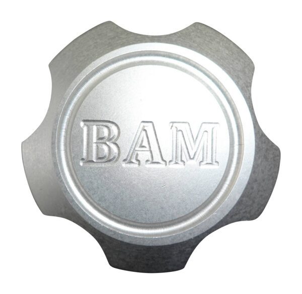 A silver cap with the word bam on it.