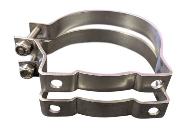 A pair of stainless steel clamps holding metal parts.