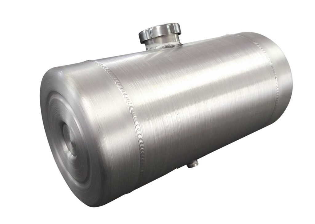 A large metal tank sitting on top of a floor.