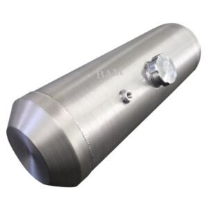 A silver cylinder shaped device with a white object on top of it.