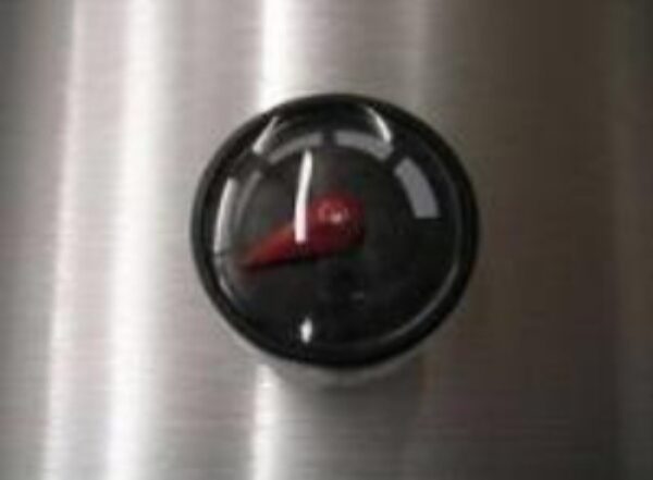 A close up of an oven with the timer turned off