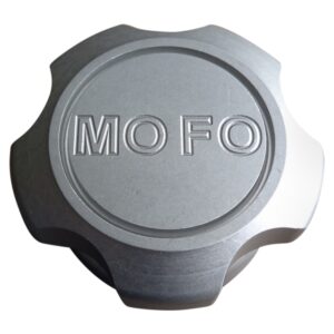 A mofo logo on the side of a silver cap.