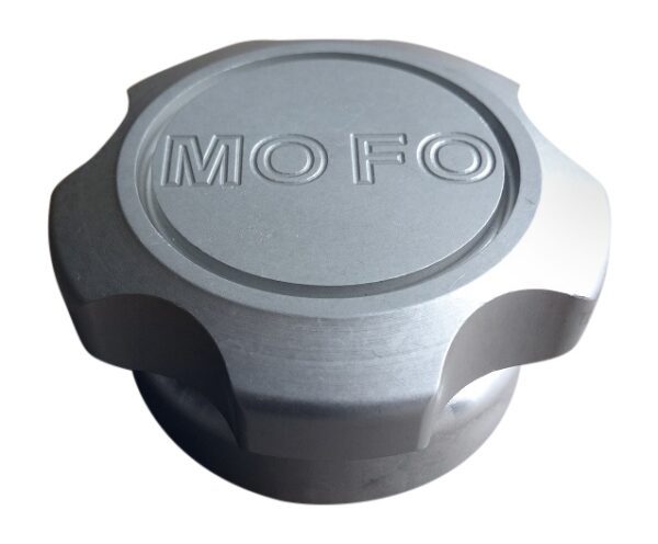 A mofo logo on the side of a silver cap.