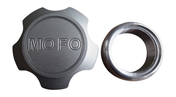 A metal cap and ring with the word " 1 0 fo ".