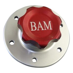 A red and silver cap with bam written on it.
