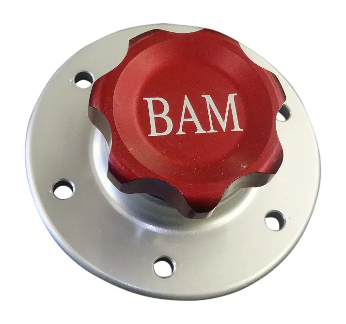 A red and silver cap with bam written on it.