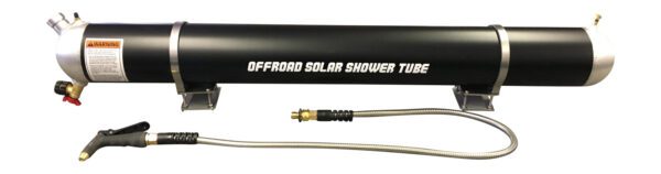 A black and white photo of an offroad solar shower tube.