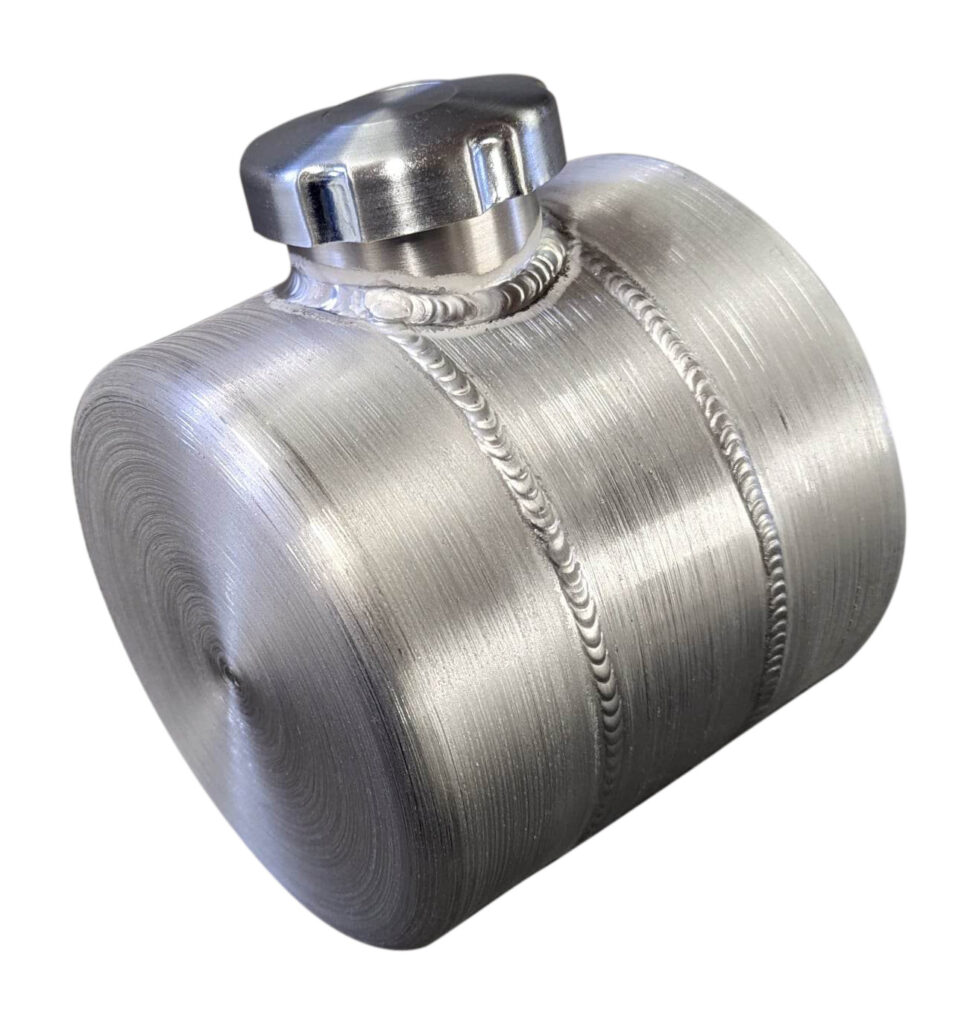 A metallic cylindrical container with a screw cap.